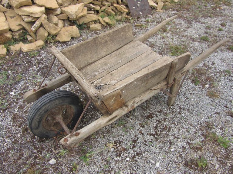 Old Wheelbarrows & Wooden Barrels Old Wheelbarrows & Wooden Barrels